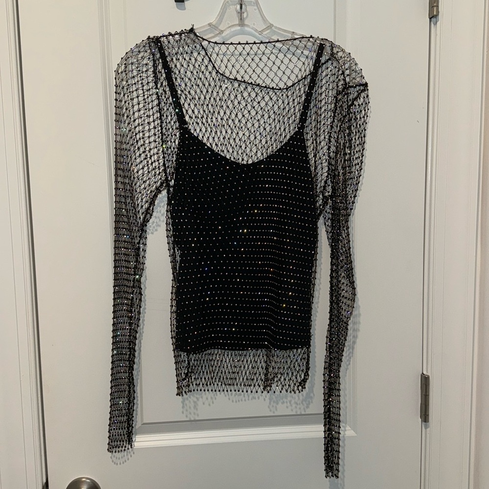 Endless rose camisole with crystal mesh overlay. Never worn. Size medium.